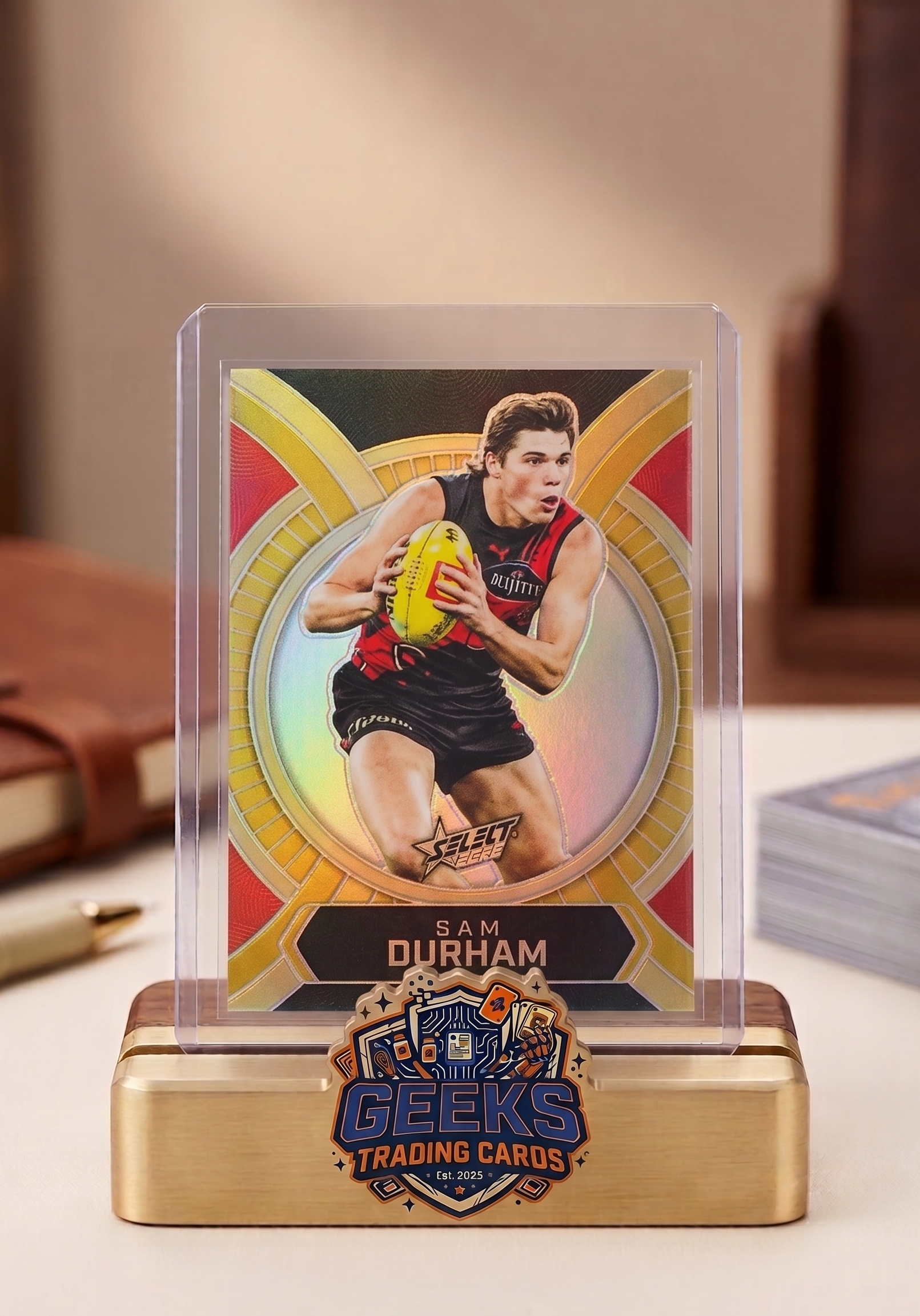 Trading card of a sports player on a stand with 'Geeks Trading Cards' branding.